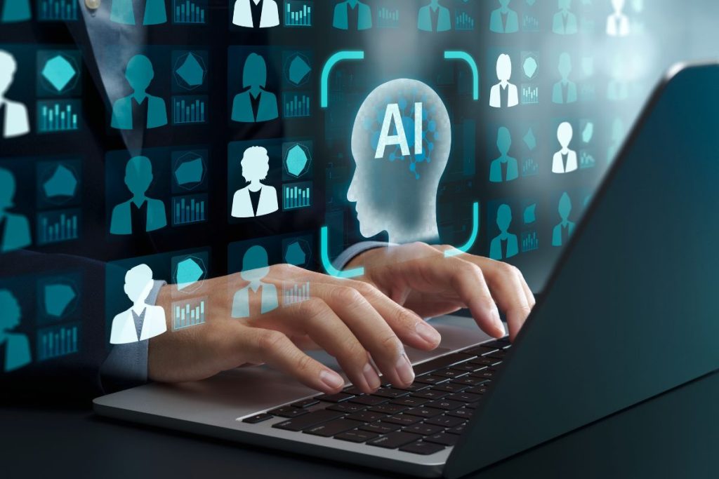HR person using a laptop with an AI icon